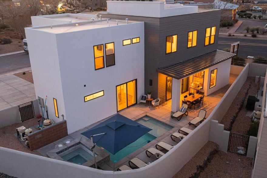 Welcome to this incredible, profitable luxury vacation rental — a rare opportunity to own a fully furnished, turn-key investment property that blends elevated design with strong income performance...PLUS potential seller financing. 
Thoughtfully designed for large gatherings and unforgettable reunions, this brand-new home features six private suites with flexible sleeping arrangements for 23+ guests. Multiple spacious living rooms create inviting spaces to gather, while still allowing privacy and comfort for multi-family stays.
Step outside to your private resort-style oasis. Enjoy the sparkling in-ground pool, unwind in the hot tub, or head up to the rooftop deck complete with a firepit, where you'll take in sweeping views of the mountains and the stunning Coral Canyon Golf Course. Whether it's sunrise coffee or sunset conversations, the 360-degree backdrop makes every moment unforgettable.
Inside, the home is being sold fully furnished with luxurious, designer pieces right down to the pool table making this a truly seamless, income-producing opportunity. Even better, bookings are already lined up into next year, providing immediate revenue from day one.
The HOA enhances the lifestyle appeal with pickleball courts and onsite RV parking availability, adding even more value for guests and owners alike.
Whether you're looking for a high-performing short-term rental investment or a personal luxury retreat that pays for itself, this property delivers on every level.
This isn't just a home it's a proven income-producing experience.