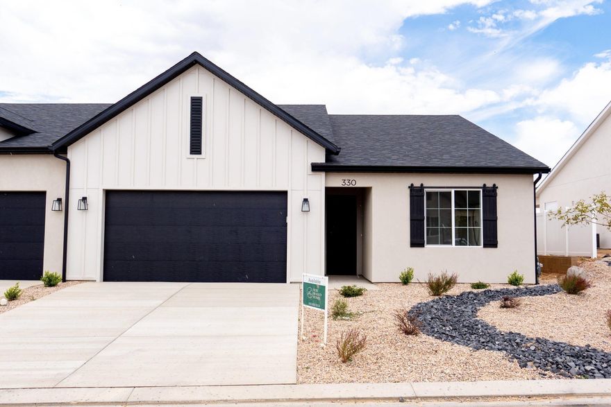 Discover your dream home under construction and ready to impress! This thoughtfully designed 3 bedroom 2 bath home offers a spacious layout with high end finishes throughout. Enjoy a deluxe glass shower in the master suite adding a touch of luxury to your daily routine. The home also features durable tile flooring in the laundry room providing both style and functionality. Step outside to a covered patio perfect for outdoor relaxation, and a professionally designed front yard enhancing curb appeal. Don't miss this opportunity to own a brand-new town home!