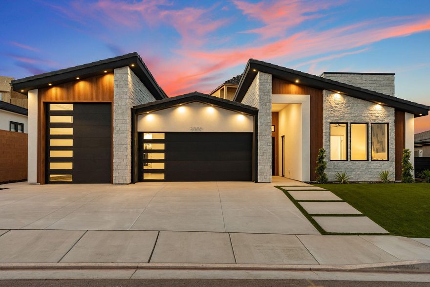 Welcome to your new construction luxury home in Washington, UT, thoughtfully crafted by Dream Tek LLC. Nestled in a quiet, well-maintained subdivision with sweeping mountain and city views, this residence offers a refined blend of modern design, efficiency, and versatile living just minutes from Coral Canyon Golf Course, schools, and local amenities.
This 4-bedroom, 4.5-bath home features a sophisticated open-concept layout with soaring ceilings, expansive hallways, and a striking coffered ceiling with ambient backlighting. Inspired by modern, contemporary design with subtle Gatsby-era elegance, the home showcases clean lines, bold accents, and thoughtfully curated finishes throughout. The great room is anchored by a dramatic feature wall with an electric fireplace, creating a warm yet contemporary focal point.
The chef's kitchen is designed for both everyday living and entertaining, featuring quartz countertops, ceiling-height custom cabinetry with soft-close dovetail construction, premium stainless-steel appliances, and a hidden walk-through pantry with direct garage access. The oversized island showcases a quartz countertop with integrated under-counter lighting, adding both ambiance and a distinctive designer touch. A 33-inch refrigerator and 33-inch freezer combination completes the space with both functionality and high-end appeal.
Each bedroom is thoughtfully designed as a private retreat, complete with its own ensuite bathroom. Every full bathroom is elegantly appointed with a rainfall showerhead and handheld wand, offering a cohesive, spa-inspired experience throughout the home. Two bedrooms are configured as fully independent casitas/ADUs, featuring separate interior and exterior entrances along with private kitchenettes, ideal for guests, multi-generational living, or income-producing opportunities.
The primary suite offers a true spa-inspired retreat, featuring a European-style wet room with a soaking tub seamlessly integrated within an oversized walk-in shower. The space is enhanced by a luxury multi-head shower system, including three rainfall showerheads and a handheld wand, creating a resort-level experience. Luxury vinyl plank flooring runs seamlessly throughout.
Enjoy a fully landscaped and fenced yard with artificial turf and an automated irrigation system. A spacious covered patio is prepped with gas and electrical hookups, perfect for outdoor entertaining.
This property also features an extra-deep 33.5' RV garage with a 10'W x 12'H door, epoxy-coated flooring, 220V EV outlet, and pre-wiring for a future mini-split system--thoughtfully designed to accommodate up to four vehicles or two vehicles plus an RV or boat.
An HOA is planned for the subdivision; estimated annual dues are approximately $180.
Please call or text to schedule a showing. Shoe covers are provided in a basket at the front door. Please wear them while walking through the home. When leaving, turn off all lights except the backlighting; the fireplace is on a timer. Please ensure any doors you open are securely locked before exiting.