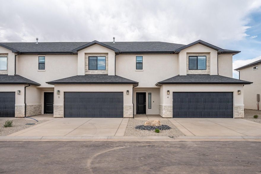 Spacious 3-bedroom, 2.5-bath townhomes with 1,716 sq. ft. over two levels. Built with 2x6 exterior walls and extra insulation, plus R-13 insulated shared walls for efficiency, comfort, and privacy. Interiors feature quartz countertops, tile flooring, carpeted bedrooms, and a master suite with separate tub, tiled shower, and walk-in closet. Homes include fridge, range, microwave, dishwasher, and window coverings. Community amenities include pickleball, basketball, playground, and pavilion. Iron Hawk Townhomes offer modern design, quality construction, and exceptional value.