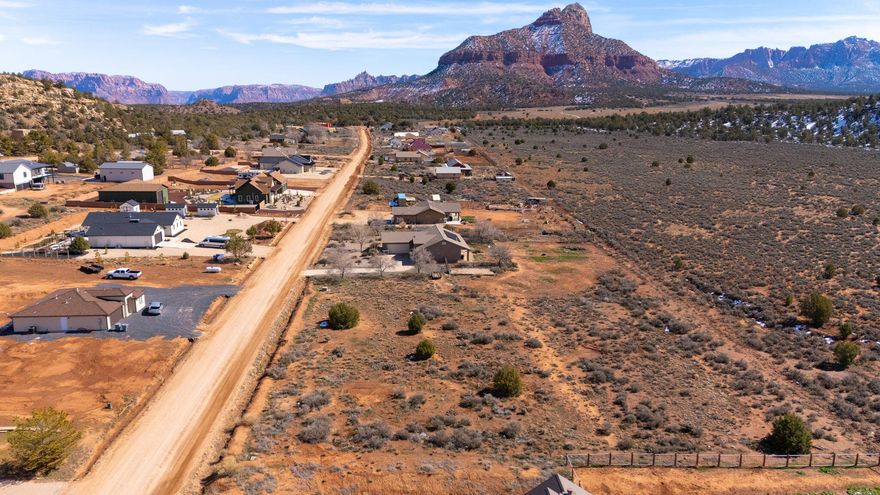 Discover the beauty and wide-open space of this exceptional 1-acre lot in Southern Utah. Surrounded by breathtaking red rock views, open desert landscape, and expansive skies, this property offers the perfect balance of privacy and accessibility. Enjoy the peace and quiet of country living while still being within convenient reach of town amenities, recreation, and everyday essentials. With plenty of room to build and create your vision, this spacious lot presents a rare opportunity to own a full acre in an area known for its stunning scenery and outdoor lifestyle.