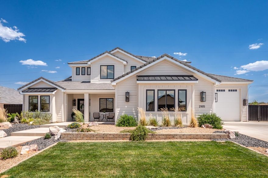 Exquisite custom home located in the Arbors, desirable Little Valley neighborhood. Quality attention to detail and high-end selections throughout! Home features a stunning iron entry door with grand entry flanked by a private office and a formal living room. Main floor has the master bedroom and a private 2nd bedroom with bathroom. Hardwood floors and oak railings, 2 floor to ceiling fireplaces,3 panel sliding door that opens to your backyard oasis. Vaulted entry, 10' ceilings throughout, butler's pantry with beverage fridge & station, custom shelving in master closet, waterfall edge quartz countertop, double fridge/freezer, water softener, tankless water heater, custom finish work and quartz backsplash are some of the details that carry throughout. Storage is ample in the oversized RV garage with a bonus storage room connected through the back walk-out. The laundry & mudroom delivers custom floor to ceiling built-ins. Fully finished/gated yard with custom saltwater pool and water falls with surround sound and landscape lighting.