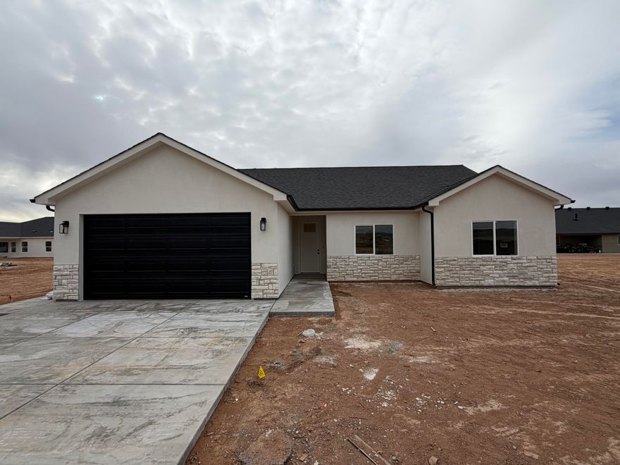 Offering $4,000 in Closing Costs when buyers use Coal Creek Mortgage. Beautiful new construction in the Valley Gate subdivision! Located in the heart of Enoch, this home offers quick access to schools, parks, shopping, and other amenities. Enjoy a bright, open floorplan with quality finishes and modern design throughout. With its prime location in a growing community, this brand-new home is the perfect blend of comfort and convenience—don't miss your chance to make it yours!