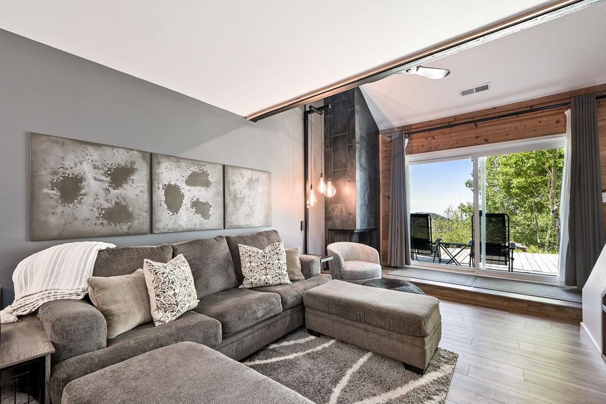 Mountain Retreat Townhome - No Steps Required Step directly into this charming rustic farmhouse-style townhome featuring one bedroom plus a loft, 1.5 bathrooms, and soaring vaulted ceilings filled with distinctive character. Thoughtful details show throughout every corner, revealing carefully chosen amenities: a spacious walk-in closet, stunning custom tilework, and a built-in wall safe for peace of mind. Modern conveniences include remote-controlled ceiling fans, automated window shades, and an integrated Bluetooth speaker system in the powder room. The thoughtfully designed layout provides comfortable sleeping for up to six guests across three distinct areas: the master bedroom with king bed, the loft featuring a full bed, and the living area with a queen sleeper sofa. Each sleeping space offers privacy and comfort. This coveted corner unit maximizes natural light through abundant windows, while the expansive 400-square-foot semi-private deck serves as an outdoor sanctuary perfect for grilling or simply taking in the breathtaking mountain and canyon vistas. The impressive 8-foot sliding glass doors seamlessly blend indoor and outdoor living spaces. Tucked away from busy streets among stately cabins, the property offers frequent wildlife sightings, deer, foxes, and other native creatures, while maintaining easy access to town with just a 15-minute stroll to the center.
The HOA handles all exterior maintenance, landscaping, and snow removal for walkways and parking areas. Recent upgrades include a beautifully remodeled community laundry facility, and the complimentary shuttle service with pickup at the property entrance makes exploring town effortless.
This pristine unit has never been part of a rental program and remains exclusively used by the owners and their family, ensuring exceptional care and maintenance.