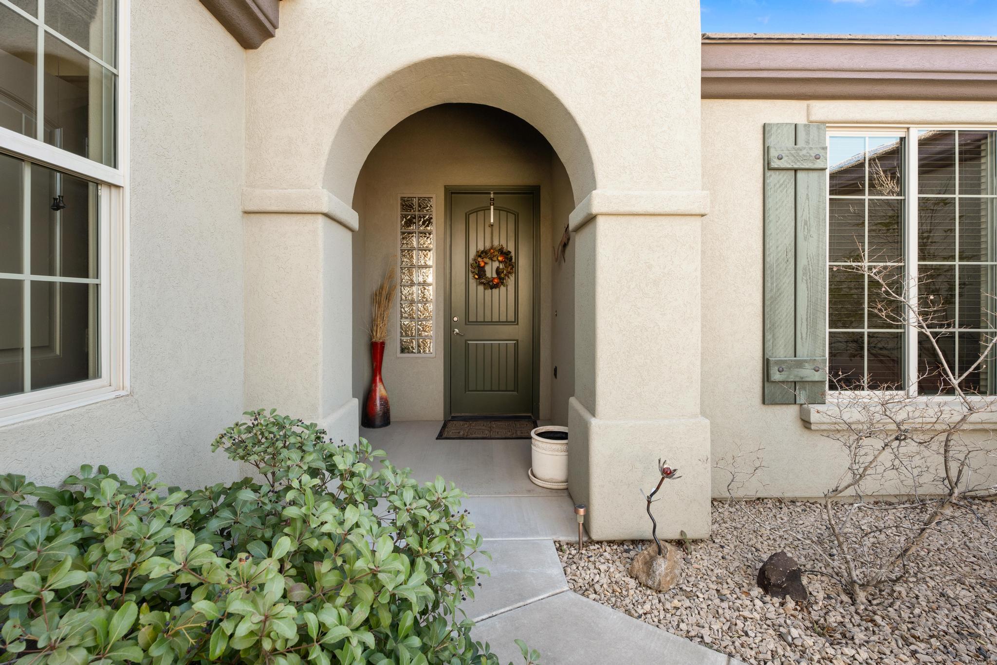 Check out this incredibly curated rustic lovers dream that offers 4-bedroom, 2.75-bathroom home in the highly sought-after Highland Park at Coral Canyon. Sitting on 0.22 acres and boasting 2,040 sq. ft. of thoughtfully designed space, this home blends custom craftsmanship, sleek finishes, and an entertainer's dream backyard-all set against the backdrop of Southern Utah's breathtaking landscape. Inside, the details shine. 9 foot ceilings, luxury vinyl plank (LVP), and tile flooring flow throughout with carpet just in the accessory bedrooms. All of this complemented by custom-built cabinetry designed and crafted by the previous owner who was a master cabinet maker. The solid surface countertops add a sleek, modern touch, while the open floor plan makes for seamless living and entertaining.