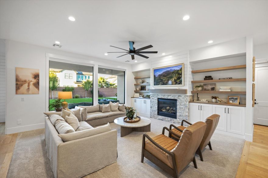 Welcome to a stunning home nestled in one of the most sought-after neighborhoods within the Crimson Cliffs High School boundaries. Designed with both luxury and livability in mind, this property features an exceptional backyard made for unforgettable memories — from family pickleball matches and basketball games to trampoline fun and relaxed evenings on the expansive patio. It's the perfect setting for barbecues, outdoor dining, and hosting the people you love. Step inside to discover generously sized bedrooms and a beautifully designed kitchen that truly feels like the heart of the home. With engineered hardwood flooring, high-quality appliances, abundant counter space, and