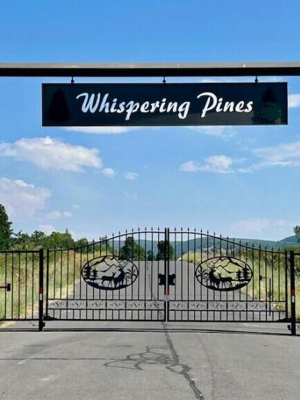 WHISPERING PINES SUB - Land