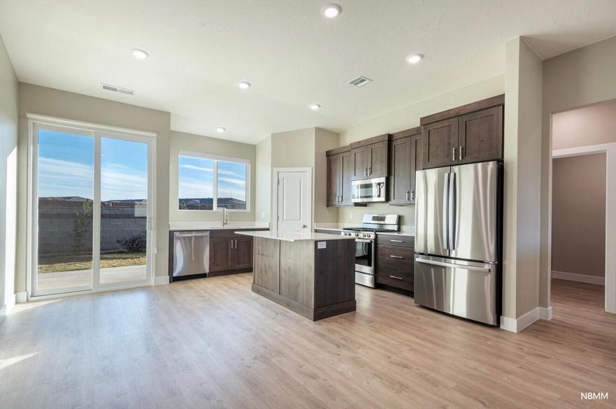 MOVE IN READY. Looks brand new. Beautiful, clean, open home concept, soft close cabinet doors and drawers, tile shower and tub, quartz counters,  tankless water heater with built-in recirc pump.  spacious yard, that is already landscaped and easy to maintain. Epoxy floor. NO HOA.