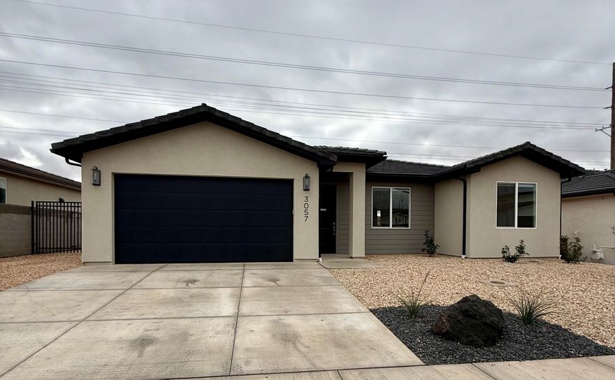 MOVE IN READY. Looks brand new. Beautiful, clean, open home,  soft close cabinet doors and drawers, tile shower and tub, quartz counters,  tankless water heater with built-in recirc pump.  spacious yard, that is already landscaped. NO HOA.
