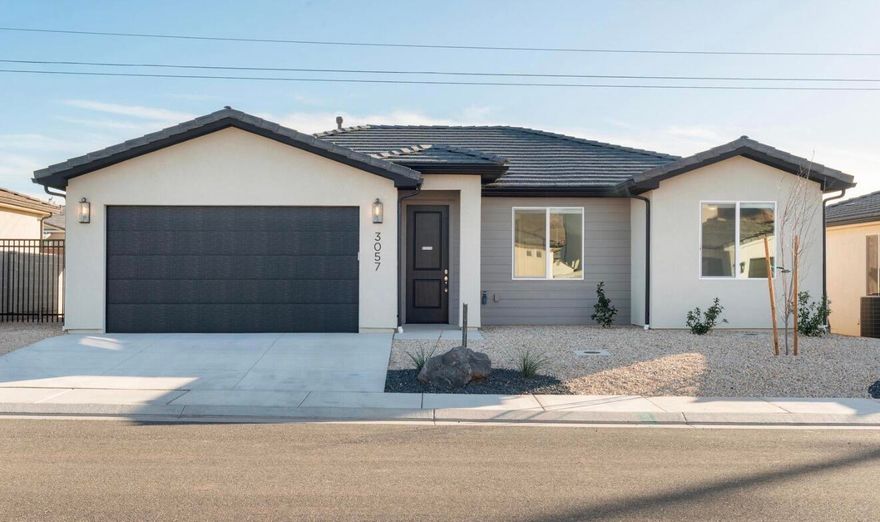 MOVE IN READY. Looks brand new. Beautiful, clean, open home concept, soft close cabinet doors and drawers, tile shower and tub, quartz counters,  tankless water heater with built-in recirc pump.  spacious yard, that is already landscaped. Epoxy floor. NO HOA.