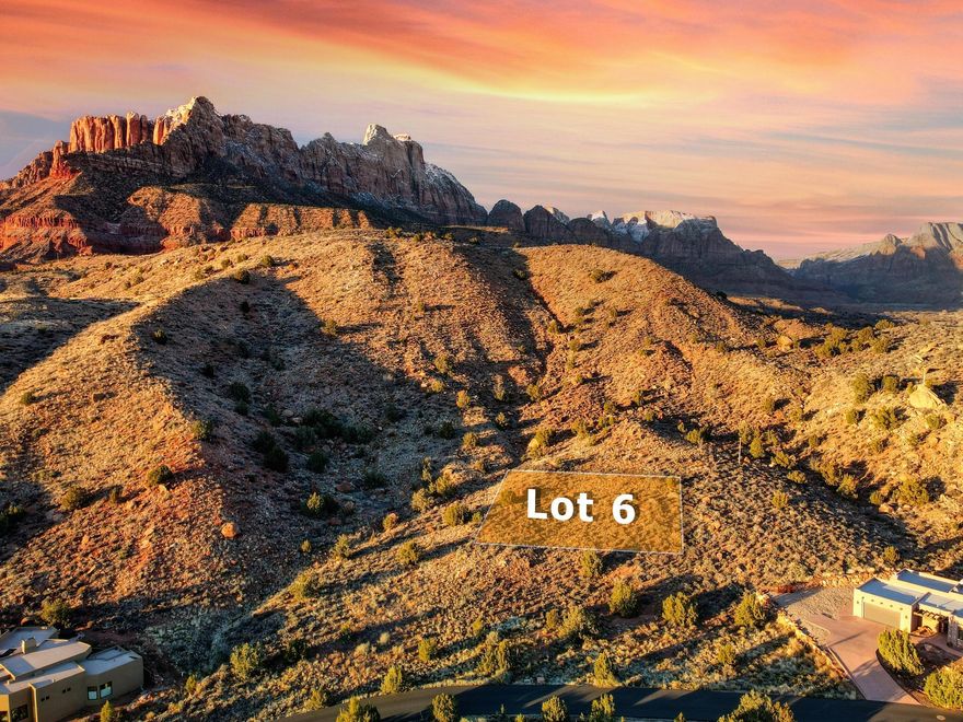 Discover the epitome of elevated living in Springdale, Utah, with this extraordinary property located in a coveted neighborhood. Situated just minutes away from the breathtaking Zion National Park, this parcel sits majestically atop a hill, offering awe-inspiring 360-degree views that will elevate your soul. With approximately .33 acres surrounded by a conservation easement, this lot provides the feeling of a sprawling 2-acre estate.

Craft your dream retreat on this tranquil oasis, designed to seamlessly blend with the natural beauty of the surroundings. Each window of your future home will act as a frame for the masterpiece of nature, providing daily panoramas of mesmerizing sunrises and sunsets. This property beckons you to forge a deeper connection with the serene landscape.