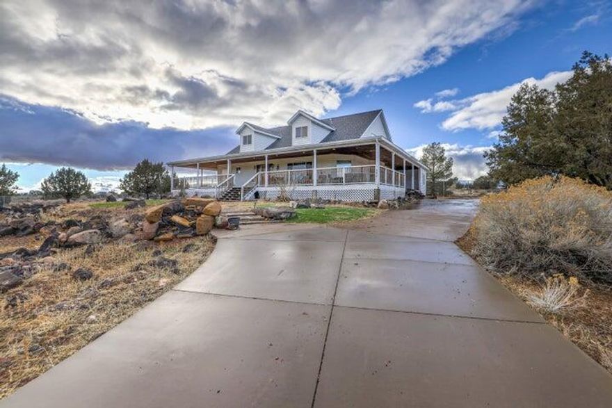 This equestrian property, nestled in the stunning Brookside area, offers beautiful views and privacy on a 1.35-acre lot. Built with 2x6 construction, the home features a spacious great room and an open kitchen with an island, new stainless steel appliances, and HVAC. Enjoy the large wrap-around porch, perfect for relaxing and taking in the scenery. A finished detached garage with living quarters, built in 2005, provides additional space and flexibility. The property is zoned to allow for up to a 2,500 sqft ADU, offering incredible potential for expansion or rental income. Seller financing and lease-to-purchase options are available.