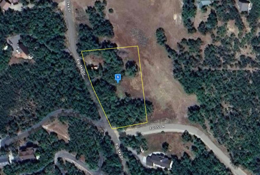 Located in the scenic Big Sky Estates community of Eden, this 1-acre wooded lot sits on a gentle slope and offers beautiful views in every direction. With water available and septic required, it's an inviting setting for anyone who loves the outdoors—just minutes from world-class skiing, hiking, biking, off-road adventures, and water sports. Whether you're envisioning a full-time residence or a relaxing weekend retreat, this property provides an ideal backdrop for your plans. Contents on the property do not convey with the sale.