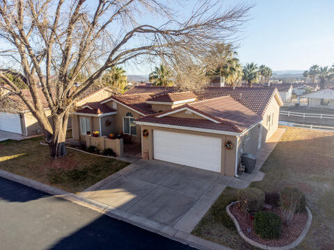 This home is situated on a prime lot in Padre Lakes, offering breathtaking southern views of one of the subdivisions largest water expanses. Inside you'll find an open great room and a separate living room. The kitchen is adorned with custom cabinets, rich hardwood floors, and expansive windows that maximize the scenic views. Impeccably maintained inside and out, it also features a two car garage with abundant storage cabinets.