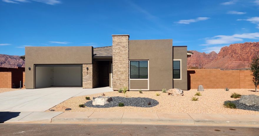 Interest rates as low as 3.999% available through our preferred lender. Must see views and larger lots. Surrounded by beautiful mountain and desert scenery. Unity Park, Fire Lake at Ivins resort, and Keyanta art village are just around the corner. Tuacahn amphitheater, Snow Canyon State Park, and Black Desert, Golf Course and resort are all a short drive away. Very open and bright floorplan. Amazing primary suite with dual closets, large shower and stand-alone tub between the vanities. GE Cafe appliances. Enjoy the amazing red rock views from you covered patio.