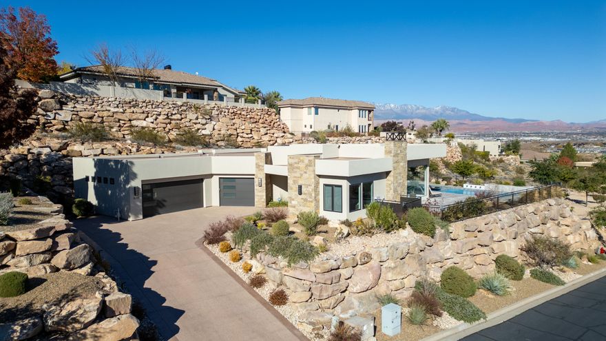 Offered ''Turn Key'' fully furnished & decorated. Located in the premier gated community, Stone Cliff with views to the NE and borders a protected open space which offers unobstructed Mountain Views & City lights. Everywhere you look, you will be pleased with the attention to detail. The Kitchen, Family, Dining & Primary Bedroom all face toward the NE where the amazing salt water pool & water feature is the focus. Thermador Double Overs, Microwave, Full Fridge & Freezer. There is tons of storage in the Kitchen. Outside to the West (off the guest rooms) features a spacious covered patio with built in kitchen, lots of seating for gatherings or a relaxing movie outside for two. To top it off there is a beautiful pool with water features within the pool, also included is a Shamu shelf and a built in spa. This home has been used as a second home and is like brand new. The home borders an Open Space Park which will never be built on and offers privacy and expansive views. Ask your agent for a list of some personal art and items that will be excluded.  Easy to show on short notice.