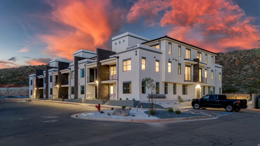 Designed for adventure and relaxation, this spacious 5-bedroom, 5-bathroom condo in Terra's Loft building offers the perfect home base for your Southern Utah escape. Spread across three stories, this thoughtfully crafted home features open living spaces, modern finishes, and a private rooftop deck with a hot tub-ideal for unwinding after a day of exploring. Enjoy access to resort-style amenities, including a pool, waterslide, lazy river, and pickleball courts, or venture out to Zion National Park, Sand Hollow, and Quail Creek. Whether you're making memories with family or friends, this condo is built for fun and convenience.