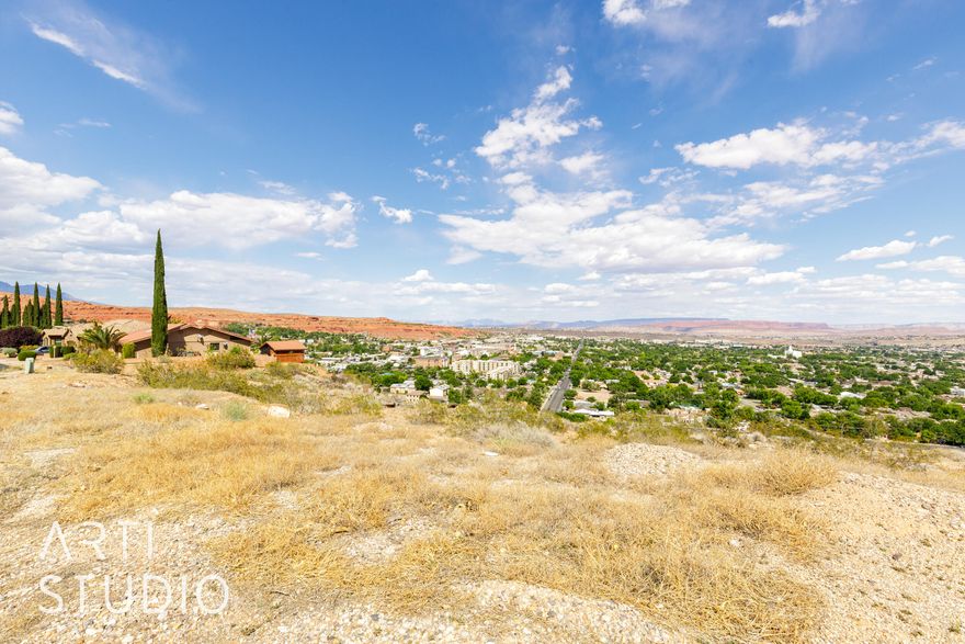 **Discover Your Slice of Paradise in St. George!** Lot 14 SPEC home being built EST Comp. 10/2026. rough pricing estimate around $1,000,000.  Breathtaking views of the St. George valley. Nestled in a serene neighborhood, this spectacular parcel of land boasts expansive, unobstructed views, perfect for those who appreciate the great outdoors and picturesque sunsets. With a backyard that faces east, you'll be able to relish the shade during the warm evenings With its prime location, you'll enjoy proximity to local amenities & recreational activities.