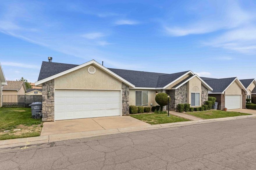 Tucked in the Cottages North community, this single-level home offers comfortable living in a great location close to nature. A two-car garage and manicured front and side lawns welcome you to the property. Inside, enjoy an airy, flowing floor plan highlighted by vaulted ceilings, new carpet, and fresh paint throughout. Spacious living and dining areas connect directly to the kitchen, which features granite countertops, stainless steel appliances including a brand new refrigerator, and a breakfast bar perfect for casual bites and conversation. The open family room includes a fireplace and skylights for natural light, while French doors extend the living space outside to a private patio and lawn. The primary suite features vaulted ceilings and its own private bathroom. Two additional bedrooms and a second full bath offer plenty of room for family
or guests. Residents enjoy access to a community pool and fantastic proximity to local
recreation. A quick walk of just a few minutes gets you to Cottonwood Cove Park and biking
trails, or indoor fun at The RinQ, Nets on Fire, and House of Jump. With the Bearclaw Poppy Trailhead also just moments away for hiking and biking, this home is perfectly positioned for
your next adventure.