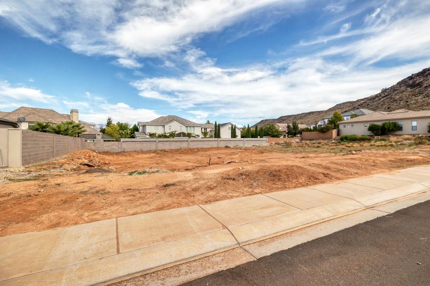 Start planning your dream home, because I have the perfect lot for you. This lot is just shy of a quarter acre and in a great neighborhood, with fantastic views of Pine Valley Mountain. Minutes from Sand Hollow State Park where you can enjoy the outdoor recreation of sand dunes, boating, camping,  or golfing. Quail Lake is also just a short ten minute drive. 
Zion National Park is definitely worth the 30 minute drive as well. Last but definitely not least, there are no HOA dues or transfer fees associated with this lot. Freedom! Bring your own builder.