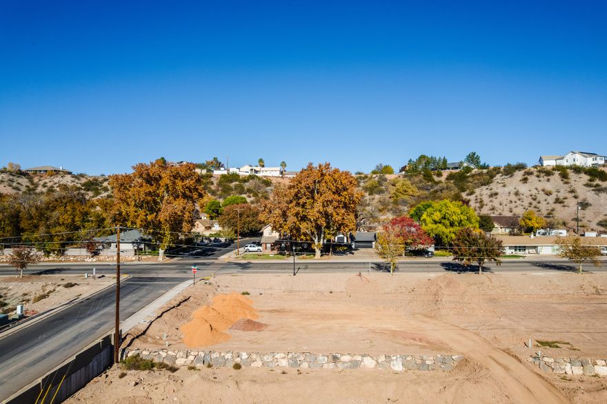 This corner lot on Santa Clara Drive is ideally situated within the Historic District. The 0.25-acre property features stubbed utilities, ready-to-pull permits, and extra dirt on site, making it easy and convenient to begin your build. Included at no additional cost are fully approved, professionally designed house plans by Shawn Patten of Creative Dimensions. Bring your own builder and take advantage of this rare opportunity to create a custom home in one of Santa Clara's most charming and desirable neighborhoods.