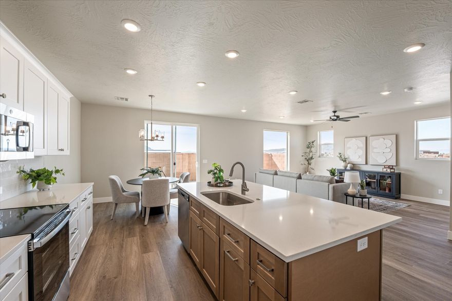 *Ask About Our Lender Incentive.* Priced at just $187 per square foot - one of the lowest per foot of any new construction home currently available - this property stands out as the best value on the market. It's time to get your tape measure out, because we haven't only added space inside the house. Our 23' wide and 24' deep garage with an 18' wide and 8' tall door is noticeably larger than the competition. Inside, the open-concept floor plan creates a seamless flow ideal for entertaining or everyday living, while generously sized bedrooms provide flexibility for family, guests, or a home office. High-end finishes shine throughout, including granite countertops, engineered wood flooring, and beautifully tiled showers and baths (that blend style with lasting durability). Perfectly positioned for adventure and convenience, this home is just minutes from the world-renowned beauty of Zion National Park, along with nearby shopping, dining, and schools--offering the best of Southern Utah living.