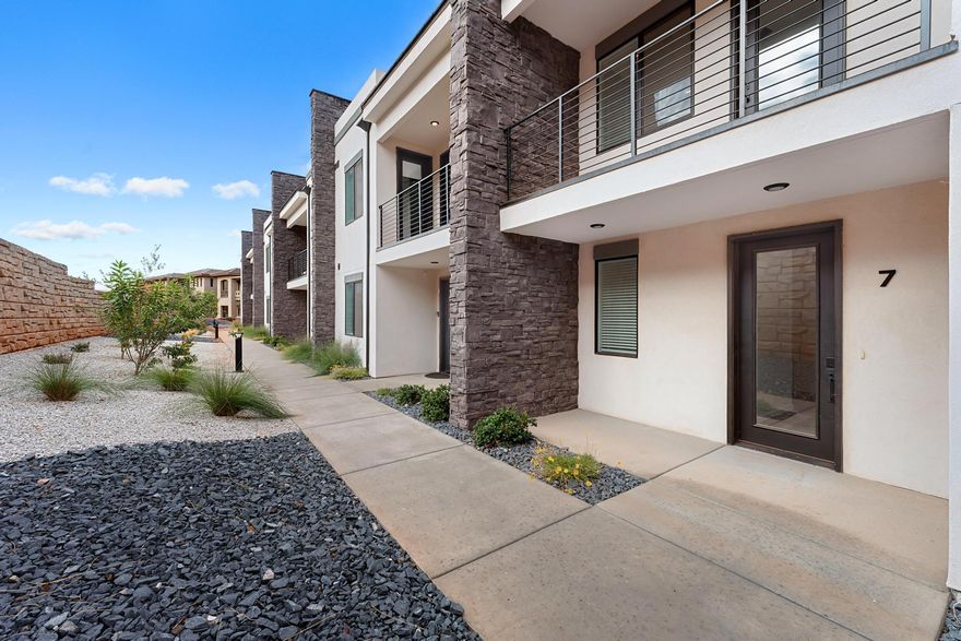 If you're looking for the ultimate Southern Utah getaway spot—or a cash-flowing addition to your empire—this is it. This luxury end-unit townhome in Terra Lofts is approved for NIGHTLY RENTALS, so it can earn while you're off living life. Inside: sleek modern design, open layout, and a rooftop deck for sunsets and stargazing. You're minutes from Zion, Sand Hollow, hiking, biking, and off-roading. And the amenities? Pools, hot tub, and a legit waterslide. Live here, vacation here, or collect nightly rental deposits—either way, opportunity is knocking. Don't ghost it.