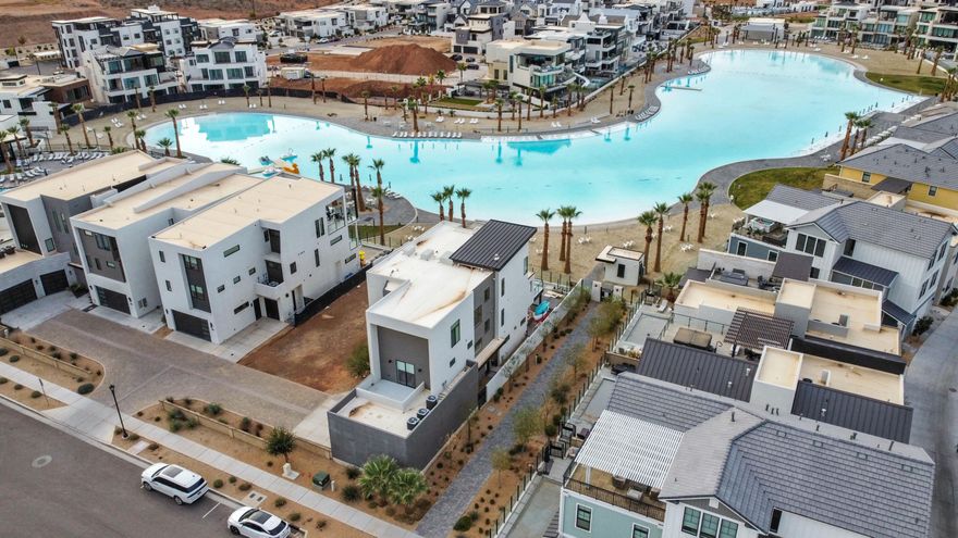 Wake up to glass smooth water, white sand beaches, and relax at night watching panoramic sunset views across the lagoon. This premier lagoon front residence is positioned directly on the water with unobstructed views in one of the most sought after locations in St George. Designed as a true luxury vacation retreat, the home features extensive upgrades, high end finishes, and designer furnishings throughout. The exceptional waterfront placement and thoughtful design have contributed to a proven track record as one of the highest performing vacation rentals in all of Desert Color. Offered as a 1/8 fractional ownership, this is a rare opportunity to enjoy luxury lagoon front living while also benefiting from outstanding rental performance. 1/4 share is also available for 800k Owner Agent.