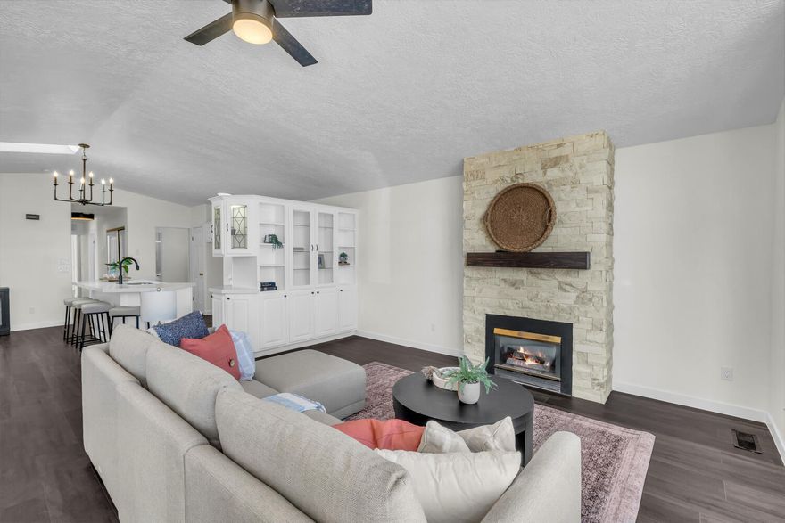 Your search for a charming home in a peaceful 55+ community has reached its end! Thoughtfully remodeled and truly move-in ready, this home features brand-new flooring, updated bathrooms, fresh paint, modern light fixtures, blinds,  countertops, and more. You will feel right at home as you step into the bright, open floorplan with plenty of functional space. Enjoy your own private workshop with endless possibilities, complete with shelving and extra storage space. Unwind in the large, low maintenance backyard. Retreat to the clubhouse, complete with a gym, library, event center, and indoor pool for year-round enjoyment. Conveniently located minutes away from shopping, restaurants, gyms, famous hiking trails, and much more. PLEASE NOTE: Home has had some settling and is priced accordingly.