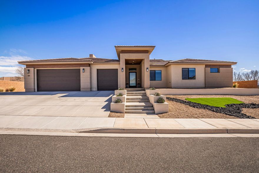 This beautiful home on the South Rim at Foremaster Ridge is a must see!  Spacious open floor plan on a quiet street!  Enjoy the benefits of being close to medical, shopping, and all the amenities of St. George, while being up on the Ridge and away from the hustle and bustle!  Need space?  This home is over 4,205 sq ft with 5 bedrooms!  Plenty of room for entertaining!  Walkout basement, huge sliding glass with hybrid covered and uncovered deck!  Come take a look!