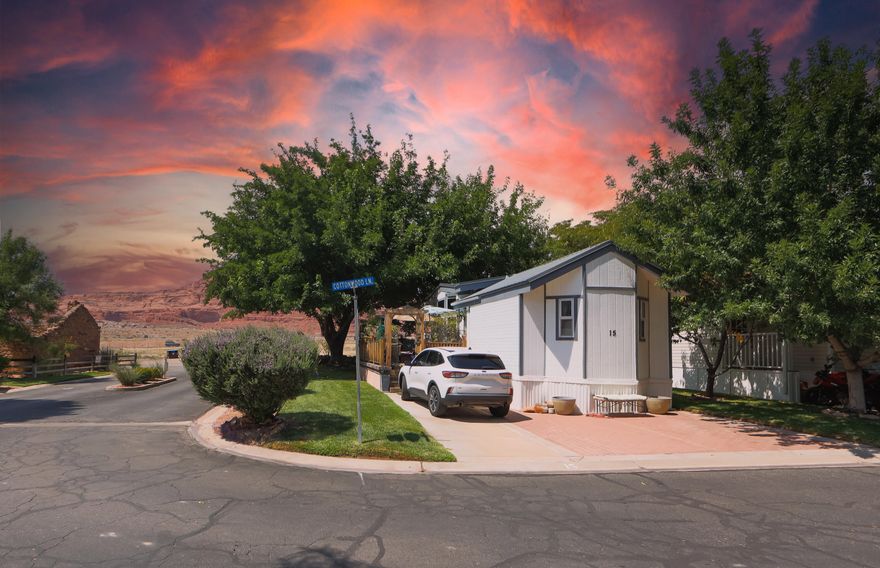 Beautifully updated home in Hurricane with one of the best decks in the community—enjoy sweeping views of the Red Cliffs. Inside you'll find fresh paint, new carpet, upgraded flooring, quartz countertops, updated cabinetry, lighting, and all major appliances along with a new HVAC system. The yard offers a peach tree for summer harvests. Just minutes from Quail Lake and endless outdoor adventure, this home blends comfort, upgrades, and location in one inviting package.