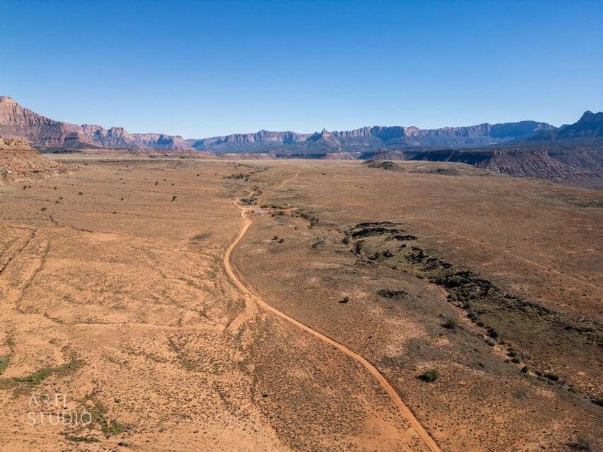 A Once-in-a-Lifetime Opportunity Near Zion National Park Welcome to 80 acres of pristine, flat, and mostly usable land -- a rare canvas of opportunity just 15 minutes from the breathtaking entrance of Zion National Park and a short 45-minute drive to St. George's vibrant downtown, regional airport, and world-class golf and recreation. Nestled just minutes off State Route 9, this private gem offers 360-degree panoramic views of Utah's red rock majesty, coupled with natural topography that ensures unmatched privacy, peace, and serenity. Whether envisioned as an exclusive retreat, a destination resort, a family ranch or a visionary master-planned community, this land holds limitless potential for those who dream big. Schedule a private tour: Bring your vision.

Build your legacy.

*Minieral rights available .

**Buyer to verify all claims and information provided, including but not limited to acreage, water and mineral rights.**