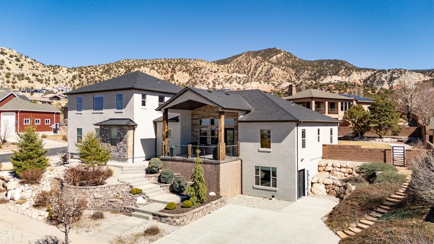 Here's your opportunity to be part of the luxury golf course community in Cedar City! This home is thoughtfully designed for comfortable everyday living AND entertaining, offering the perfect balance of gathering spaces and private retreats. The main level is set up for you to live, gather, & enjoy all essential spaces without needing to go upstairs or downstairs. This home also provides additional space for family, guests, or future needs on both the upper & lower levels. The basement offers potential for multi-generational living, already plumbed for a kitchen with its own private entrance and parking. Enjoy the cozy living room fireplace, butler's pantry, hot water recirculation pump, water softener, fully fenced & landscaped yard, and more, all in a highly sought-after neighborhood! All furniture, including piano, included with full price offer. Step inside to a bright, open-concept living space where vaulted ceilings and expansive windows frame stunning views and fill the home with natural light. The living room features tile flooring and a gas fireplace with a custom mantle and stone surround, creating a warm focal point for everyday living and entertaining alike.

The kitchen offers an oversized island with abundant storage and seating, custom wood cabinetry, granite countertops, a stylish backsplash, and a stainless range hood. In addition to the gas range, double wall ovens make hosting and holiday cooking effortless. Just off the kitchen, a butler's pantry provides additional prep space and storage, keeping everything organized and within reach.

The main-level primary suite is thoughtfully positioned for privacy, set apart from the other bedrooms to create a secluded retreat. Enjoy direct access to the backyard patio, along with a versatile attached flex room (ideal for a home office, gym, nursery, etc.). The ensuite bathroom delivers a true spa-like experience with dual vanities, a soaking tub, and a tile shower with dual shower heads. The walk-in closet is complete with built-ins for optimal organization.

Upstairs, you'll find a spacious bonus living area that can adapt to your needs, whether as a media room, playroom, or creative space, along with a bedroom and full bathroom. Double doors allow this entire level to be closed off, offering privacy and comfort for guests or extended stays.

The basement expands the home's versatility even further, featuring a large family room with space for a game table or entertainment setup, three additional bedrooms, a full bathroom, and multiple storage areas. Already plumbed for a future kitchen and equipped with its own separate entrance and parking, this level offers excellent potential for multi-generational living or long-term guests.

Additional features include a water softener, hot water recirculation pump for added efficiency, and an EV charger in the garage.

Situated in the highly desirable Cedar Ridge subdivision, this home offers an upscale feel with private, quiet streets, well-maintained surroundings, and a strong sense of community pride. Residents enjoy access to a neighborhood park and proximity to the golf course, making it easy to take full advantage of the lifestyle this area provides.

Outdoor recreation is right at your doorstep, with the 13th Hole trail system nearby (perfect for biking, walking, or running), and the clubhouse is just minutes away.

Conveniently located just minutes from Southern Utah University, Cedar City Hospital, the Cedar City Regional Airport, and everything else that Cedar City has to offer. You're also just an hour from St George, two hours to Las Vegas, and 3 hours to Salt Lake City.