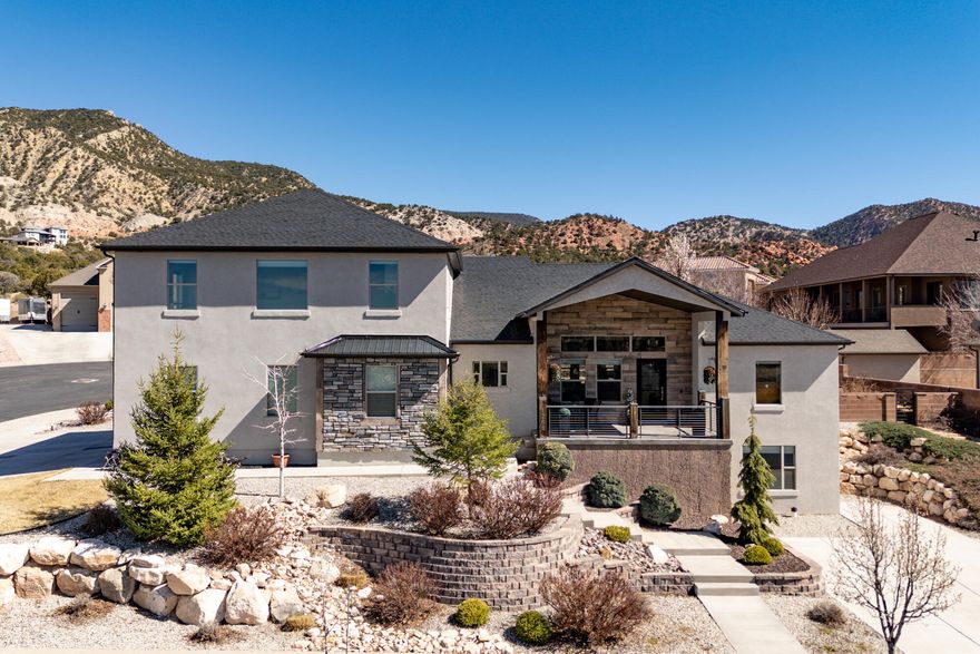 Here's your opportunity to be part of the luxury golf course community in Cedar City! This home is thoughtfully designed for comfortable everyday living AND entertaining, offering the perfect balance of gathering spaces and private retreats. The main level is set up for you to live, gather, & enjoy all essential spaces without needing to go upstairs or downstairs. This home also provides additional space for family, guests, or future needs on both the upper & lower levels. The basement offers potential for multi-generational living, already plumbed for a kitchen with its own private entrance and parking. Enjoy the cozy living room fireplace, butler's pantry, hot water recirculation pump, water softener, fully fenced & landscaped yard, and more, all in a highly sought-after neighborhood! All furniture, including piano, included with full price offer. Step inside to a bright, open-concept living space where vaulted ceilings and expansive windows frame stunning views and fill the home with natural light. The living room features tile flooring and a gas fireplace with a custom mantle and stone surround, creating a warm focal point for everyday living and entertaining alike.

The kitchen offers an oversized island with abundant storage and seating, custom wood cabinetry, granite countertops, a stylish backsplash, and a stainless range hood. In addition to the gas range, double wall ovens make hosting and holiday cooking effortless. Just off the kitchen, a butler's pantry provides additional prep space and storage, keeping everything organized and within reach.

The main-level primary suite is thoughtfully positioned for privacy, set apart from the other bedrooms to create a secluded retreat. Enjoy direct access to the backyard patio, along with a versatile attached flex room (ideal for a home office, gym, nursery, etc.). The ensuite bathroom delivers a true spa-like experience with dual vanities, a soaking tub, and a tile shower with dual shower heads. The walk-in closet is complete with built-ins for optimal organization.

Upstairs, you'll find a spacious bonus living area that can adapt to your needs, whether as a media room, playroom, or creative space, along with a bedroom and full bathroom. Double doors allow this entire level to be closed off, offering privacy and comfort for guests or extended stays.

The basement expands the home's versatility even further, featuring a large family room with space for a game table or entertainment setup, three additional bedrooms, a full bathroom, and multiple storage areas. Already plumbed for a future kitchen and equipped with its own separate entrance and parking, this level offers excellent potential for multi-generational living or long-term guests.

Additional features include a water softener, hot water recirculation pump for added efficiency, and an EV charger in the garage.

Situated in the highly desirable Cedar Ridge subdivision, this home offers an upscale feel with private, quiet streets, well-maintained surroundings, and a strong sense of community pride. Residents enjoy access to a neighborhood park and proximity to the golf course, making it easy to take full advantage of the lifestyle this area provides.

Outdoor recreation is right at your doorstep, with the 13th Hole trail system nearby (perfect for biking, walking, or running), and the clubhouse is just minutes away.

Conveniently located just minutes from Southern Utah University, Cedar City Hospital, the Cedar City Regional Airport, and everything else that Cedar City has to offer. You're also just an hour from St George, two hours to Las Vegas, and 3 hours to Salt Lake City.