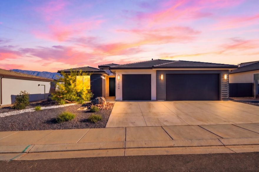 Welcome to this beautifully crafted, move-in ready home offering the freedom of no HOA. Designed for comfortable living, the layout opens into a bright great room with 10-foot vaulted ceilings and durable luxury vinyl plank flooring. The kitchen is a true standout, complete with GE Profile appliances, quartz countertops, rich stained alder cabinets featuring soft-close hardware throughout, and a large hidden pantry.

The primary suite serves as a relaxing retreat, offering a freestanding tub and a separate shower with tile extending all the way to the ceiling. Practical, everyday upgrades are already taken care of, including an installed water softener, a tankless water heater with a built-in recirculating pump, and custom window blinds.

Step outside to find a fully landscaped and fenced yard complete with gates. For those with outdoor gear, the property provides a dedicated side RV parking setup with a sewer cleanout and hose bib, perfect for keeping a trailer or toys right at home. This property combines thoughtful construction with everyday convenience. Contact us today to schedule a tour.

The exterior twilight photo has been digitally enhanced for lighting.

Seller is a licensed real estate agent in the state of Utah.