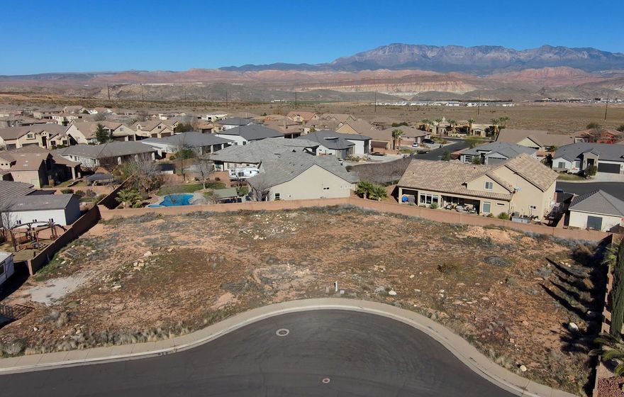 Build your dream home on this oversized 0.31-acre lot (about 13,500 sq ft) in the sought-after Dixie Springs community in Hurricane, Utah. Most lots here are under a quarter acre, so you get extra space and breathing room. No HOA and bring your own builder, build the custom home you've been planning, including an RV garage for all the toys. Want even more room? The lot next door is available too, giving you over a half acre combined. Minutes to Sand Hollow Reservoir, Sand Mountain OHV, for boating, off-roading, hiking, and mountain biking.