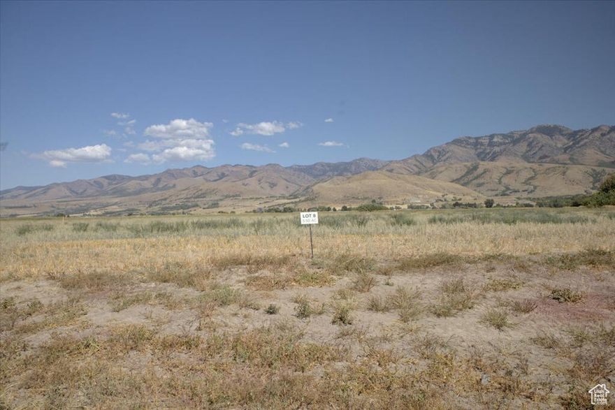 Welcome to Cub River Estates where you have room to breathe. This 5.5 acre lot in peaceful Cove, Utah offers fertile ag ground, secondary water and stunning views. Ideal for a custom home with a shop, garden or animals, just 15 minutes from Cherry Peak.