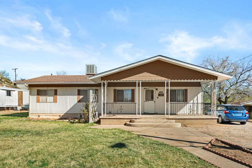 Affordable opportunity with potential! This 2 bed, 2 bath 1977 Hillcrest mobile home offers 1,056 sq ft on a spacious 0.22-acre lot with pressurized irrigation. Features include natural gas heat, central A/C, a small workshop, and plenty of room for RV or extra parking. The home needs updating but could shine with some TLC--great for investors or buyers looking to customize. Roof-mounted evaporative cooler is not hooked up. Sold As-Is and priced accordingly--bring your ideas and make it your own!