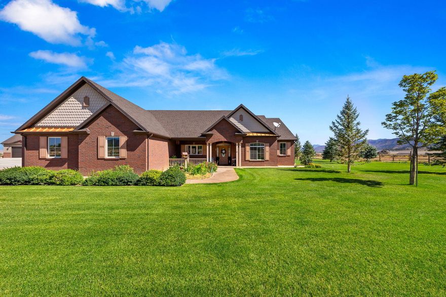 Located on a quiet street close to the mountains with similar estate-style properties, this 2016 estate has it all: a 4-bedroom home beautifully designed &
thoughtfully planned for aging-in-place by making doors & spaces wheelchair accessible; agricultural land along with water & irrigation infrastructure to work it; a car lover's dream garage & shop with Bendpak lift, compressed air, 2 RV and 2 car rollup doors; a barn for farm equipment & general storage, and finally, the potential for an income suite (15 min to ski resort)! A total of 5892 sq ft of built space IN ADDITION to the home! Property includes a 500 ft deep, 12'' well, 6 acre feet of water rights and agri land in Greenbelt. This amazing property is a must see! Ask your Realtor for the features flyer for complete details & specs