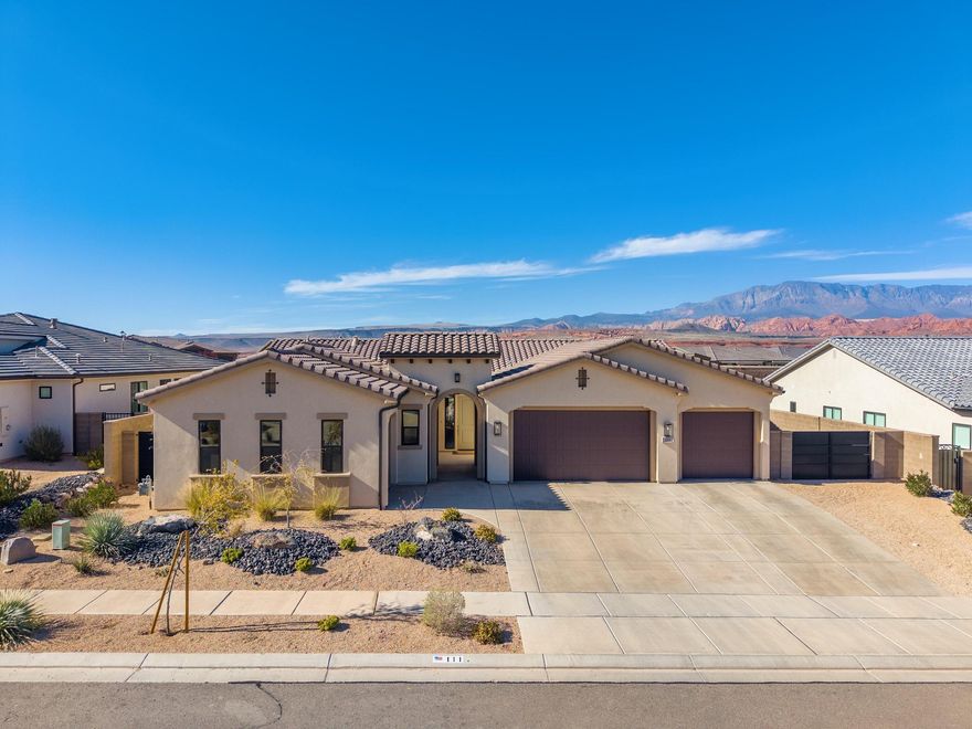 Welcome to your own private retreat! This beautifully designed home features 10-foot ceilings and an open, airy layout that instantly feels both spacious and inviting. 
A stunning sliding glass door creates seamless indoor-outdoor living, opening to a private backyard complete with a tranquil water feature, creating the perfect setting for relaxing or entertaining. With the 4 car garages, there's plenty of storage space.  
Located in an exceptional neighborhood, you'll love the easy access to scenic walking and biking trails with breathtaking views