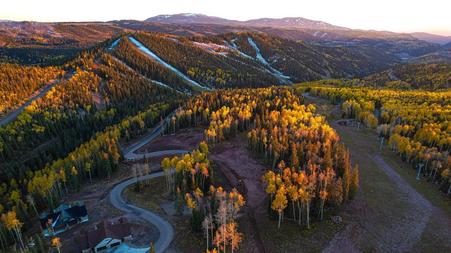 This lot is in the final phase of Aspen Crest consisting of 8 lots.  This lot is one of the nicest ski-in/ski-out lots in the country with gorgeous 360 degree views.  Taxes are an estimate as this is a new subdivision.  Aspen Crest Premier II offers large, flat lots adjacent to the site of the future Town Square.  Signature sunset views down Beaver Canyon are sure to awe.  Own your piece of Eagle Point in Aspen Crest today to learn what true alpine serenity & solitude feel like.