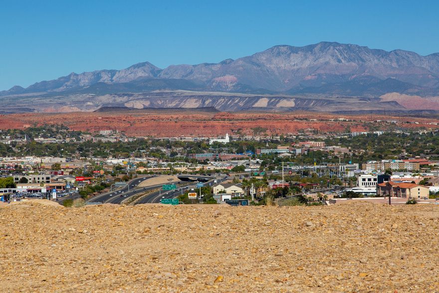 Tens of thousands of dollars spent to prep this incredibly commanding Lot overlooking the vast valley of St. George, northward to Pine Valley and eastward to Zion. Non-duplicatable. Large size to accommodate your floor plan and lifestyle needs. YOU choose your own builder too. NO HOA fees. CC&R's provide direction on what you can build to have a consistent neighborhood with a variety of home elevations. A prime ''location, location, location'' within minutes to downtown St. George, I-15, Southgate golf course, big box stores and all things quickly reached.