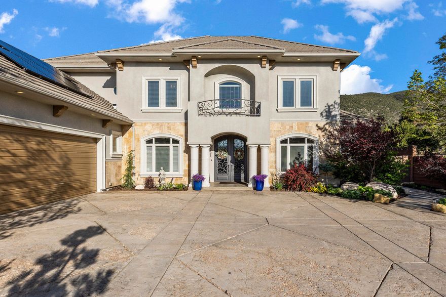 Tucked away at the end of a quiet road in the desirable Ashdown Forest community, lies this architectural marvel of a home. The Mediterranean Revival style home with a Tuscan influence has been thoughtfully designed to offer sweeping mountain views of Fiddlers Canyon and a peaceful setting to match. From the moment you arrive, you'll notice the impressive curb appeal, iron front door, and welcoming entry that opens into a light-filled foyer with cathedral ceilings and panoramic windows that bring in sunshine all day. Inside, the home features high ceilings, hardwood floors, shiplap accents, fireplace, stackable large patio doors, neutral three-tone paint, and granite countertops throughout. The open-concept layout includes spacious rooms, a beautifully finished kitchen, and a magnificent primary suite designed for comfort and privacy. The oversized 3-car garage includes 24-solar panels (10 Kw) with a battery wall, and there's even an RV pad for your extra toys. Additional features include a primary suite with sauna, 100 gallon water heater, RO and entire home water filtration system, whole house light automation, and so much more. The side yard offers plenty of room to create your dream outdoor space: whether it's a pool, pickleball court, or another fun-filled area for family gatherings. With well-manicured landscaping and space to entertain, this home offers a rare mix of style, comfort, and opportunity in one of Cedar City's most scenic neighborhoods. This is a must-see for anyone looking to enjoy mountain views, open living, and space to grow.

Cedar City is one of the most beautiful cities. It is home to Southern Utah University and the Shakespeare Festival, as well as some amazing restaurants. As part of Southern Utah, you will experience a lifestyle like no other. The area features nearby internationally recognized mountain biking trails, road cycling, hiking, golf courses, national parks such as the Grand Canyon, Zion, & Bryce, national moments, national forest, reservoirs, & some of the most iconic desert landscapes in the world. Less than an hour away from Brian Head Ski Resort, there is no doubt that this is a fun place to live and play.

All information herein is deemed reliable but is not guaranteed. Buyer is responsible to verify all listing information, including square feet/acreage, to the buyer's own satisfaction.
