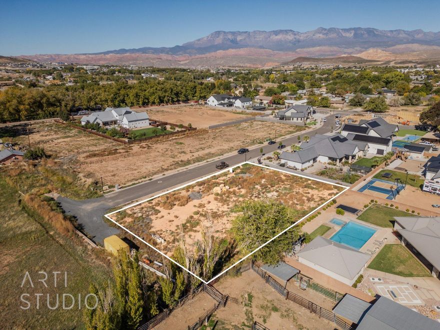 Discover this premier 0.53-acre flat lot in Dratter Estates, nestled among luxury homes. Experience tranquil surroundings, stunning views, and convenient access to 700 W. Build your dream home your way. Bring your own builder!
