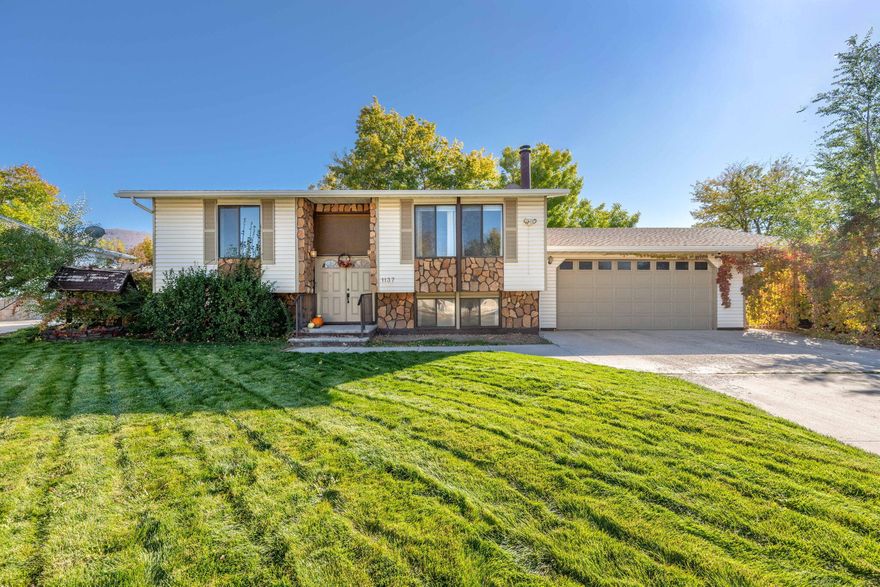 Welcome to this 4-bed, 2-bath home located in the heart of Cedar City, just minutes from Southern Utah University. Split level home built in 1973 and spanning approximately 2,188 sq/ft. Inside, you'll find a thoughtful floor plan with both upstairs and daylight-basement levels. The basement has been fully renovated with sound proofing, new carpet and walls. In addition, all the plumbing and electrical have been updated to code for your peace of mind and safety. The basement has an outside entrance, giving the potential for a separate rental unit or multi-purpose space (zoned R-3-M). Outside, enjoy a fully landscaped and fenced backyard shaded by mature trees, fireplace seating area and an expansive uncovered deck with storage sheds and a dog run. This home is nestled in an established, quiet neighborhood with easy access to schools, shops, and parks. Whether you're seeking an ideal family home or an investment property with flexibility, this home offers strong versatility in a trusted Cedar City neighborhood with many amenities.