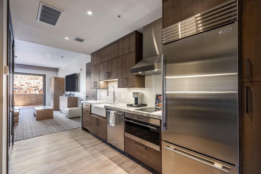 Discover your place at Black Desert Resort with this thoughtfully designed Studio King residence, ideally located just steps from the future five-acre Black Desert Rapids water park—now under construction and slated for completion in Spring 2027. Offering 642 square feet of well-appointed living space, this studio features a spacious layout with a kitchenette equipped with Wolf and Sub-Zero appliances, a full-size refrigerator, in-unit washer and dryer, and a pull-out queen sofa to comfortably accommodate family or guests. Ownership includes Black Desert Resort Club membership, providing access to an exceptional lineup of world-class amenities. Black Desert is a true sanctuary where luxury meets adventure, set against dramatic desert landscapes. Unwind by the fireplace, rejuvenate with treatments at the internationally renowned spa, stay active in the state-of-the-art fitness center, or tee off on Tom Weiskopf's championship golf coursehost of an annual PGA TOUR FedExCup event. Enjoy everything from casual dining to elevated culinary experiences, boutique shopping, and premier events, including the inaugural PPA Major pickleball tournament in March 2026.

Located in sunny St. George with over 300 days of sunshine and just minutes from Zion National Park, this residence offers an unmatched resort lifestyle in one of the Southwest's most exciting destinations. Contact us today to schedule your private tour and become part of the vibrant Black Desert community.