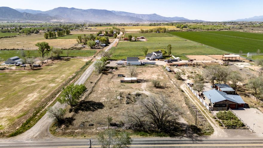 1.81 Acre corner lot in Iron County zoned commercial with many uses and endless opportunity and possibilities. Shared well & 3.27 Acre Feet of Water included. (3 from 73-718 with priority date of 1934 & 0.27 AFW from 73-1833 with priority date of 1955). Sold as-is. Buyer to verify.
