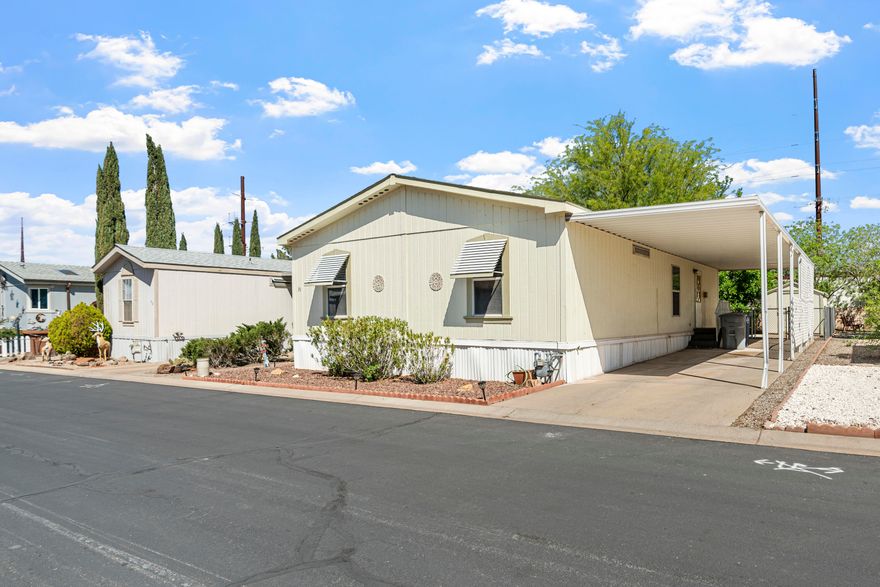 Charming 3 bed, 2 bath home in 55+ Paradise Palms community! This well-kept home features newer interior paint, newer flooring throughout, and a cozy kitchen full of charm. Enjoy the newer deck, spacious backyard, storage shed. Paradise Palms is a cooperative community where residents collectively own the land. The association fee covers land taxes, land payment, water, cable, common area maintenance. Buyers must complete their own due diligence and be approved by the HOA prior to closing. Check it out today--comfort and easy living await. Don't miss this one!