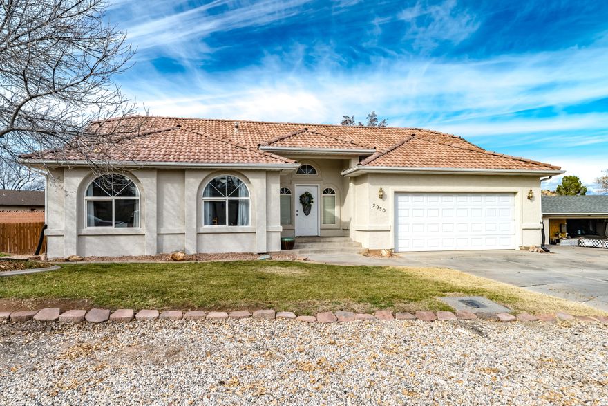 Well-located home on a quiet street in the desirable Bloomington Hills area. Fresh Exterior paint and new carpet provide a clean, move-in ready feel. Situated on a .25-acre lot with a fully fenced backyard, RV parking, in-ground trampoline, fire pit, and covered patio—ideal for outdoor living. Prime location within walking distance to elementary, middle, and high schools, as well as the golf course. Dixie Power. Listing information deemed reliable, buyer to verify