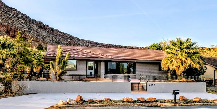 Spacious, comfortable floorplan in Bloomington Country Club Subdivision. Den w/½ Bath currently used as a 3rd Bedroom (unofficial). Additional 360 SQFT enclosed Screen Room--Great for a Hot Tub, BBQ, Play Room & 129 SQFT Shed (see attachments/images). Views of the mountains and Bloomington Golf course from Front Patio, Living Room & Dining Room. Recent upgrades and more potential.